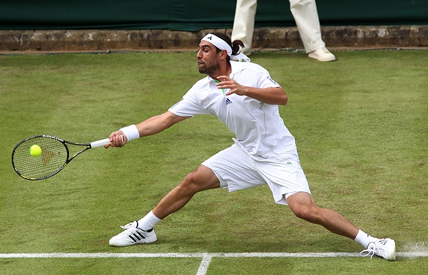 Marcos Shines In SW19 Sun