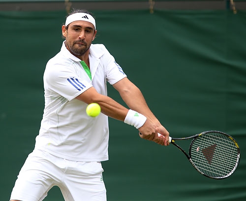 Marcos loses to Djokovic