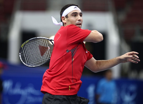 Marcos Trounces Troicki