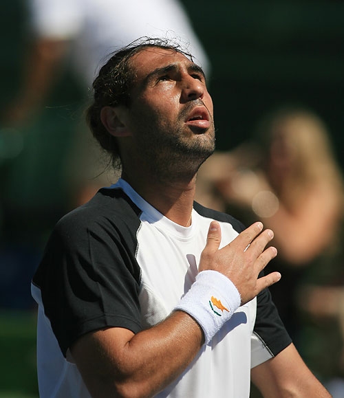 Marcos Edges Federer In Thrilling Victory